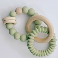 
              Duo Silicone Teething Ring
            